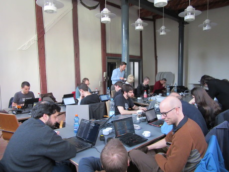 Hackers hacking at the venue.